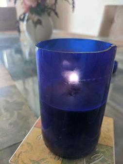 In Upcycled Blue Glass Bottles 8.oz